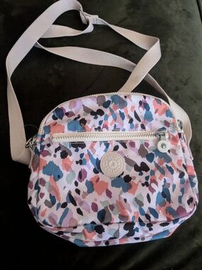 Kipling Keefe crossbody bag in the Dotty Splash print, featuring double zip comp